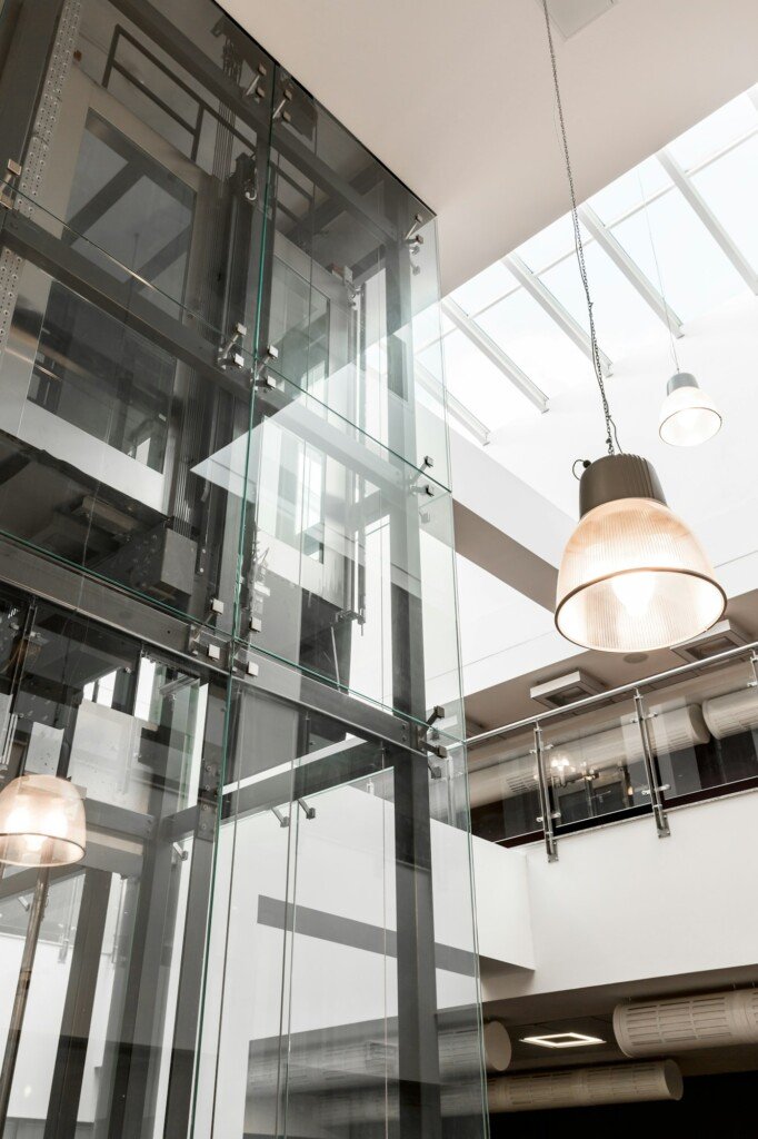 Glass elevator in modern building